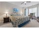 Cozy bedroom with beach-themed decor, a ceiling fan, a desk, and natural light at 4887 Luster Leaf Circle # 104, Myrtle Beach, SC 29572