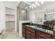Spacious bathroom featuring granite counters, glass enclosed shower, and walk-in closet at 496 Starlit Way, Myrtle Beach, SC 29579