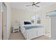 Bright bedroom with carpet flooring featuring a ceiling fan and shuttered windows at 496 Starlit Way, Myrtle Beach, SC 29579