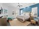 Comfortable bedroom with natural light, ceiling fan, and stylish furniture at 496 Starlit Way, Myrtle Beach, SC 29579