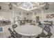 Recreation room with game tables and seating in a bright room with stylish fixtures at 496 Starlit Way, Myrtle Beach, SC 29579