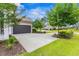 Large driveway with ample parking and beautiful landscaping in a residential neighborhood at 496 Starlit Way, Myrtle Beach, SC 29579