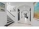 Elegant hallway with decorative lighting and tiled floors leading to rooms at 496 Starlit Way, Myrtle Beach, SC 29579