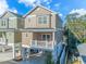 Two story home with a covered patio and ground-level parking beneath the elevated living space at 505 Chester St 5Th Ave. N, Myrtle Beach, SC 29577