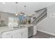 Bright kitchen featuring stainless appliances, granite countertops, and sleek white cabinetry at 505 Chester St 5Th Ave. N, Myrtle Beach, SC 29577
