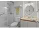 Bright, clean bathroom with a glass-enclosed shower, fresh towels, and a well-lit vanity at 523 S Ocean Blvd. # 305, North Myrtle Beach, SC 29582
