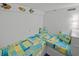 Nautical themed bedroom featuring built-in beds with starfish-themed quilts and decor at 523 S Ocean Blvd. # 305, North Myrtle Beach, SC 29582
