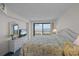 Bedroom features a beach view, wicker furniture, and a comfortable bed at 523 S Ocean Blvd. # 305, North Myrtle Beach, SC 29582