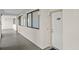 Hallway with unit doors and windows at 523 S Ocean Blvd. # 305, North Myrtle Beach, SC 29582