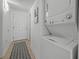 Convenient laundry closet with stacked washer and dryer for easy laundry access at 523 S Ocean Blvd. # 305, North Myrtle Beach, SC 29582