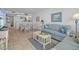 A comfortable living room with dining area and open view to the kitchen at 523 S Ocean Blvd. # 305, North Myrtle Beach, SC 29582