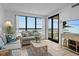 Comfortable living room with ocean view and access to private balcony at 523 S Ocean Blvd. # 305, North Myrtle Beach, SC 29582