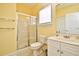 Bright bathroom features a glass enclosed shower, a toilet, and a sink with storage at 5650 Barefoot Resort Bridge Rd. # 431, North Myrtle Beach, SC 29582