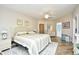 Spacious bedroom with a king size bed, ceiling fan, and stylish decor at 5650 Barefoot Resort Bridge Rd. # 431, North Myrtle Beach, SC 29582