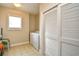 Functional laundry room featuring a washer, dryer, and storage space at 5650 Barefoot Resort Bridge Rd. # 431, North Myrtle Beach, SC 29582