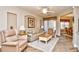 Cozy living room featuring comfortable seating, a ceiling fan, and natural light at 5650 Barefoot Resort Bridge Rd. # 431, North Myrtle Beach, SC 29582