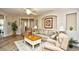 Comfortable living room features neutral tones, ceiling fan, and modern furnishings at 5650 Barefoot Resort Bridge Rd. # 431, North Myrtle Beach, SC 29582