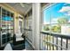 Relaxing screened porch with comfortable seating and views of the neighborhood at 5650 Barefoot Resort Bridge Rd. # 431, North Myrtle Beach, SC 29582