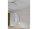 An empty bedroom featuring carpet floors, neutral walls, and a connecting hallway at 571 Fernwood Rd., Murrells Inlet, SC 29576