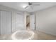 Neutral carpeted bedroom features standard closet and ceiling fan at 571 Fernwood Rd., Murrells Inlet, SC 29576