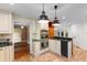 Gourmet kitchen with stainless steel appliances, custom cabinets, and granite countertops at 571 Fernwood Rd., Murrells Inlet, SC 29576