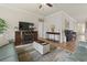 Warm living room with fireplace and entertainment center at 5716 Lombardia Circle, Myrtle Beach, SC 29579