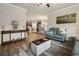 Cozy living room with bright, neutral color palette and ceiling fan at 5716 Lombardia Circle, Myrtle Beach, SC 29579
