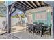 Charming outdoor patio with a BBQ grill, wooden chairs and a dining table creating a perfect space for entertaining guests at 6001 - 1195 S Kings Hwy., Myrtle Beach, SC 29575