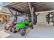 Carport with two golf carts parked underneath, providing convenient transportation within the coastal community at 6001 - 1195 S Kings Hwy., Myrtle Beach, SC 29575