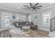 Bright and inviting living room with sectional sofa, ceiling fan, and decor at 6001 - 1195 S Kings Hwy., Myrtle Beach, SC 29575