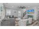 Cozy living room with a large sectional sofa, TV, and staircase at 6001 - 1195 S Kings Hwy., Myrtle Beach, SC 29575
