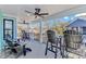 Spacious, covered porch with ceiling fans and comfortable seating, perfect for relaxing and enjoying the beautiful outdoor view at 6001 - 1195 S Kings Hwy., Myrtle Beach, SC 29575