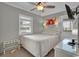 Comfortable bedroom with a full bed, flat screen TV, and an exterior entrance at 6001 - 1459 S Kings Hwy., Myrtle Beach, SC 29575