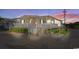 Charming beach house with a cozy front porch and well-maintained landscaping, perfect for coastal living at 6001 - 1459 S Kings Hwy., Myrtle Beach, SC 29575