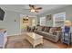 Comfortable living room featuring hardwood floors, access to dining, and neutral colors at 6001 - 1459 S Kings Hwy., Myrtle Beach, SC 29575