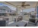 Inviting covered porch featuring comfortable seating, a ceiling fan, and charming string lights for evening relaxation at 6001 - 1459 S Kings Hwy., Myrtle Beach, SC 29575