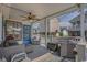 Cozy covered porch with stylish outdoor furniture and a ceiling fan, creating a perfect space for relaxation at 6001 - 1459 S Kings Hwy., Myrtle Beach, SC 29575
