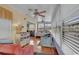 Bright sunroom featuring hardwood floors, ceiling fans, and access to the living room at 6001 - 1459 S Kings Hwy., Myrtle Beach, SC 29575