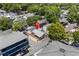 Aerial view of neighborhood highlighting home's location, mature trees, and nearby parking at 6001 - Z-49 S Kings Hwy., Myrtle Beach, SC 29575