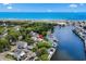 Aerial view of home, waterfront, neighborhood, and ocean coastline in distance at 6001 - Z-49 S Kings Hwy., Myrtle Beach, SC 29575