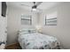 Inviting bedroom with twin bed, side table, and windows, perfect for a restful retreat at 6001 - Z-49 S Kings Hwy., Myrtle Beach, SC 29575