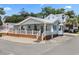 Charming single-Gathering home featuring a spacious porch and a well-maintained exterior at 6001 - Z-49 S Kings Hwy., Myrtle Beach, SC 29575