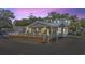 Charming single-Gathering home featuring a spacious porch and a well-maintained exterior at 6001 - Z-49 S Kings Hwy., Myrtle Beach, SC 29575