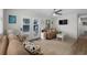Warm living room with comfortable seating and access to a private outdoor space at 6001 - Z-49 S Kings Hwy., Myrtle Beach, SC 29575