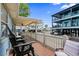 Relaxing view from the porch with comfortable seating and a glimpse of the community at 6001 - Z-49 S Kings Hwy., Myrtle Beach, SC 29575
