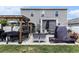 Entertainer's backyard featuring a BBQ pergola, outdoor seating, a hot tub gazebo, and ample patio space at 651 Choctaw Dr., Conway, SC 29526
