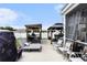 Spacious backyard with a dining pergola, hot tub under gazebo, lounge chair, and outdoor seating at 651 Choctaw Dr., Conway, SC 29526