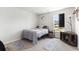 Cozy bedroom with a comfy bed, soft natural light from a large window, and stylish decor at 651 Choctaw Dr., Conway, SC 29526