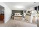 Elegant main bedroom with accent wall, chandelier, and matching dresser sets at 651 Choctaw Dr., Conway, SC 29526