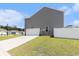 Exterior view of a modern two-story home with a two-car garage, driveway, and fenced backyard at 651 Choctaw Dr., Conway, SC 29526